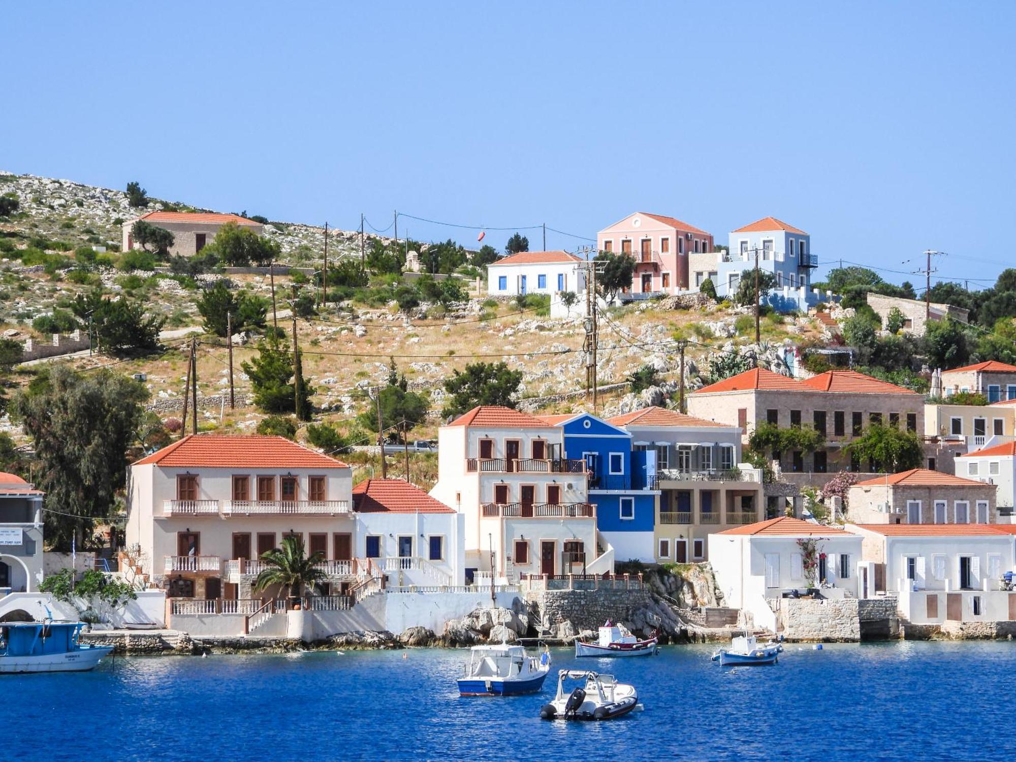 Porphyra Studio Chalki Town Quarto foto